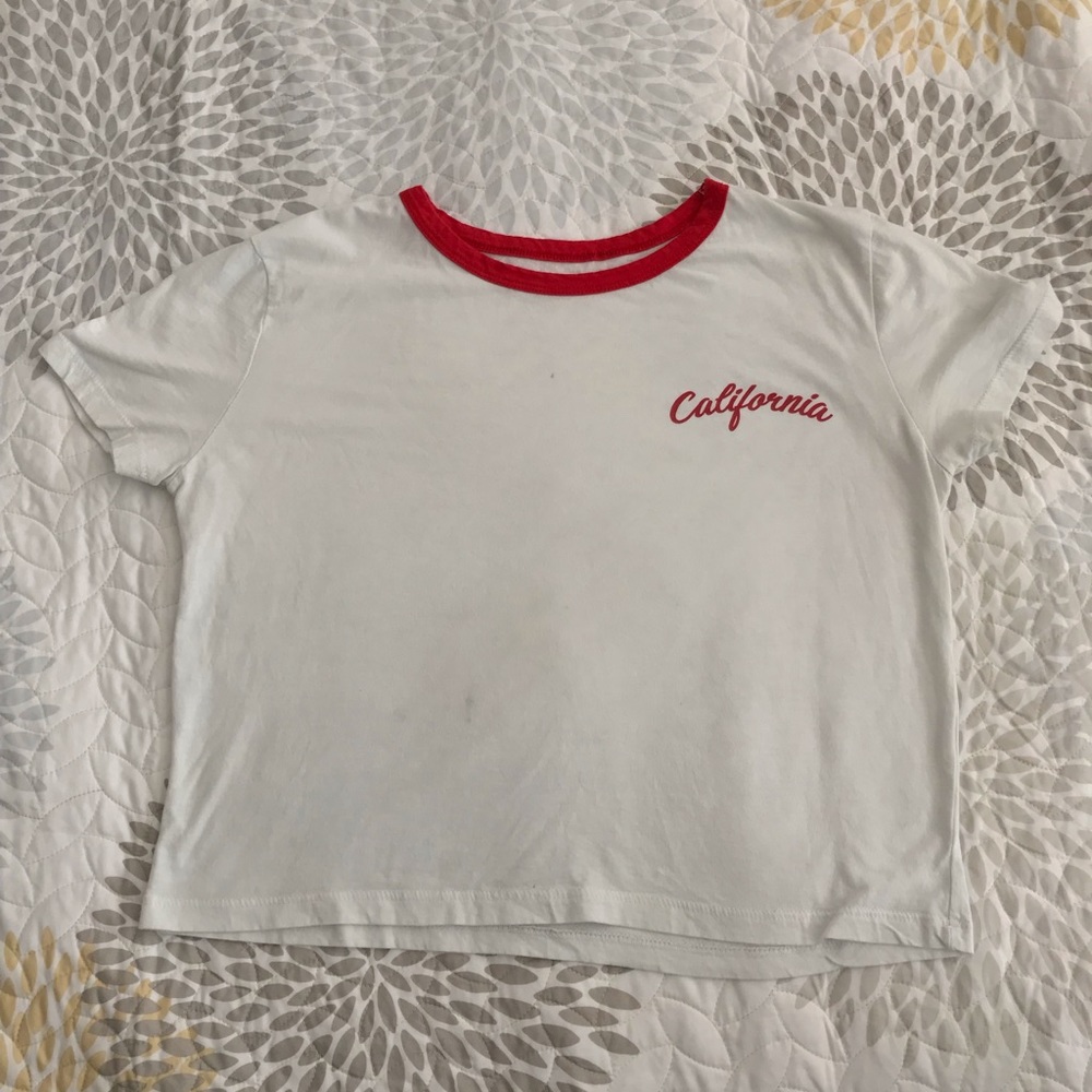 White crop top with red accents